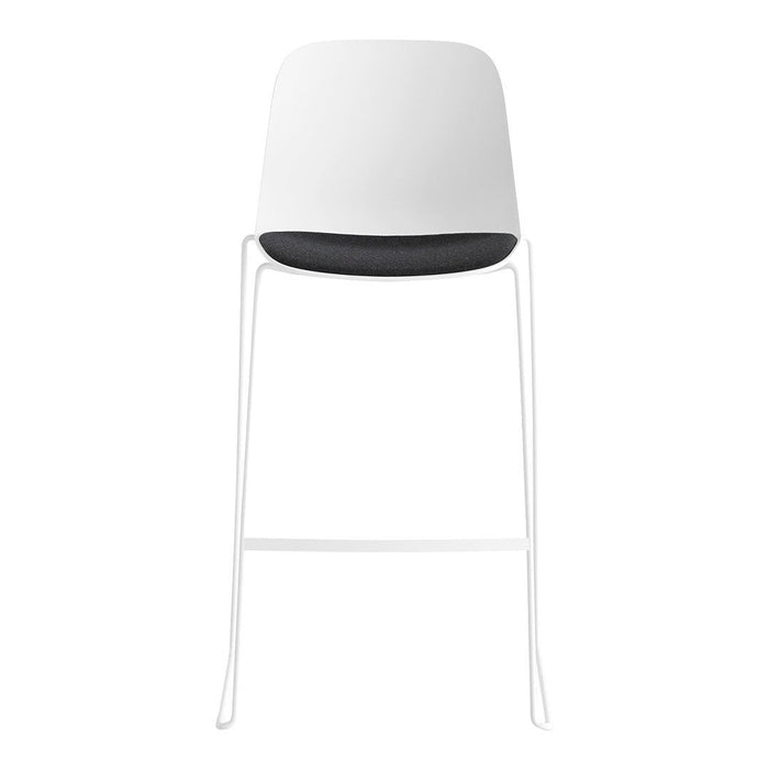 Modern white bar stool with a sleek black cushion and minimalist design. Perfect for contemporary decor.