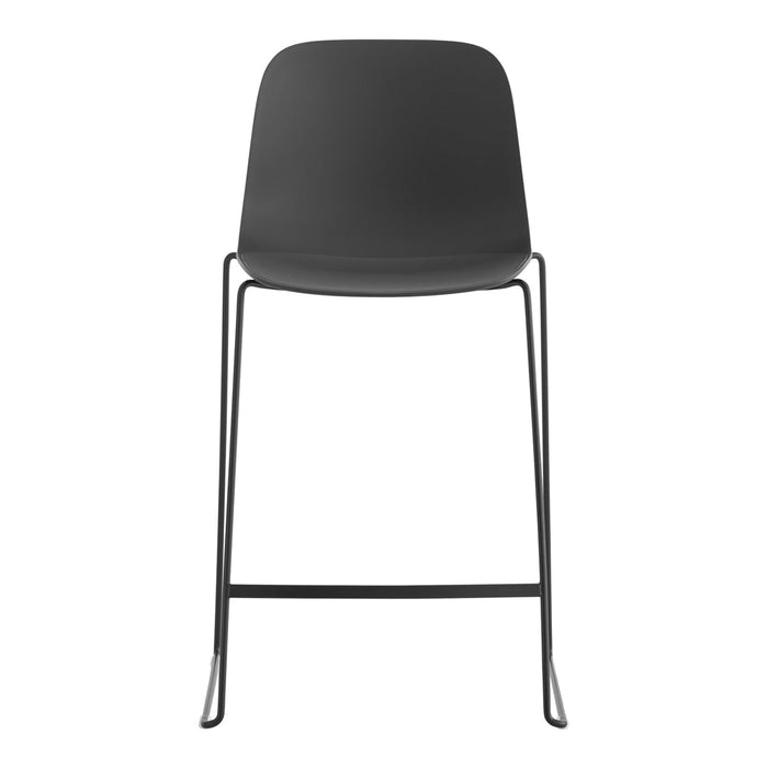 Sleek black bar stool with a minimalist design and smooth surfaces, perfect for modern interiors.