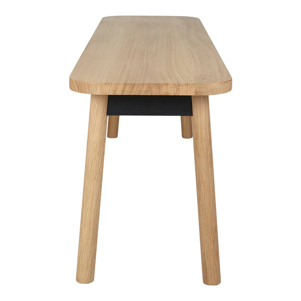 Light oak wood table with a smooth finish and black accent drawer, featuring clean lines and minimalist design.