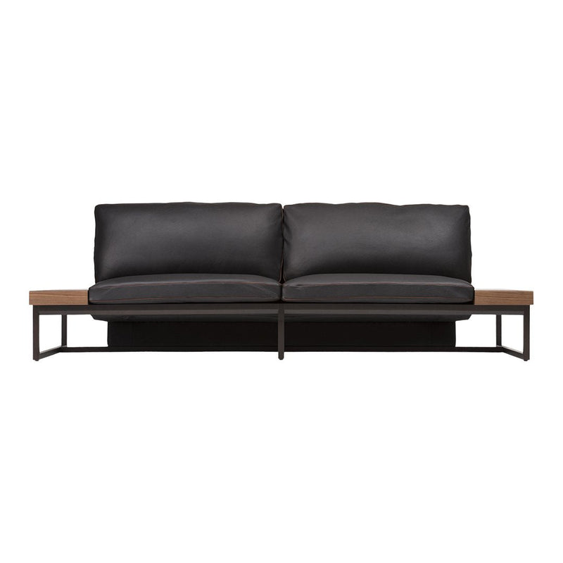 Stylish black leather sofa with a minimalist metal frame and wooden accents for modern decor.