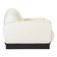 "Textured cream upholstery sofa with a sleek black base, featuring subtle ribbed patterns for modern elegance."