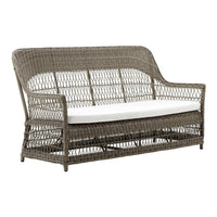 Gray woven outdoor loveseat with a white cushion, featuring a textured pattern and elegant design. Ideal for any patio.