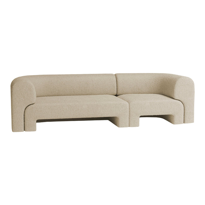 Beige textured sofa with a modern, curved design, perfectly blending comfort and style for any living space.