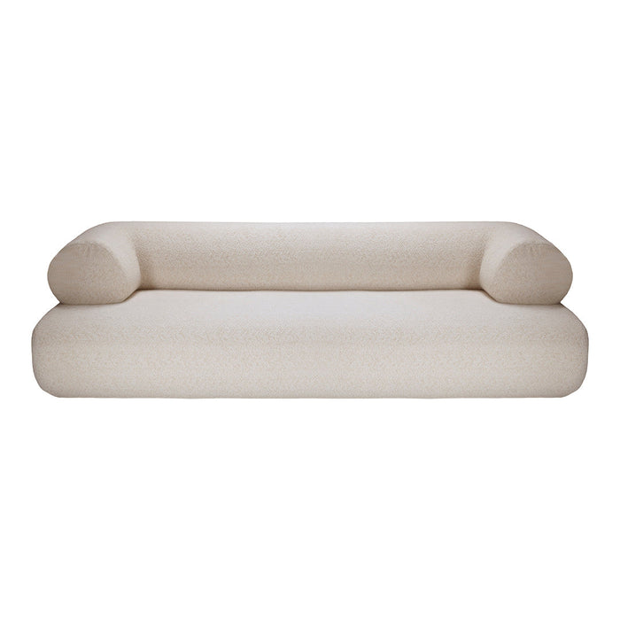 Cozy cream sofa with soft texture and rounded armrests, perfect for modern living spaces.
