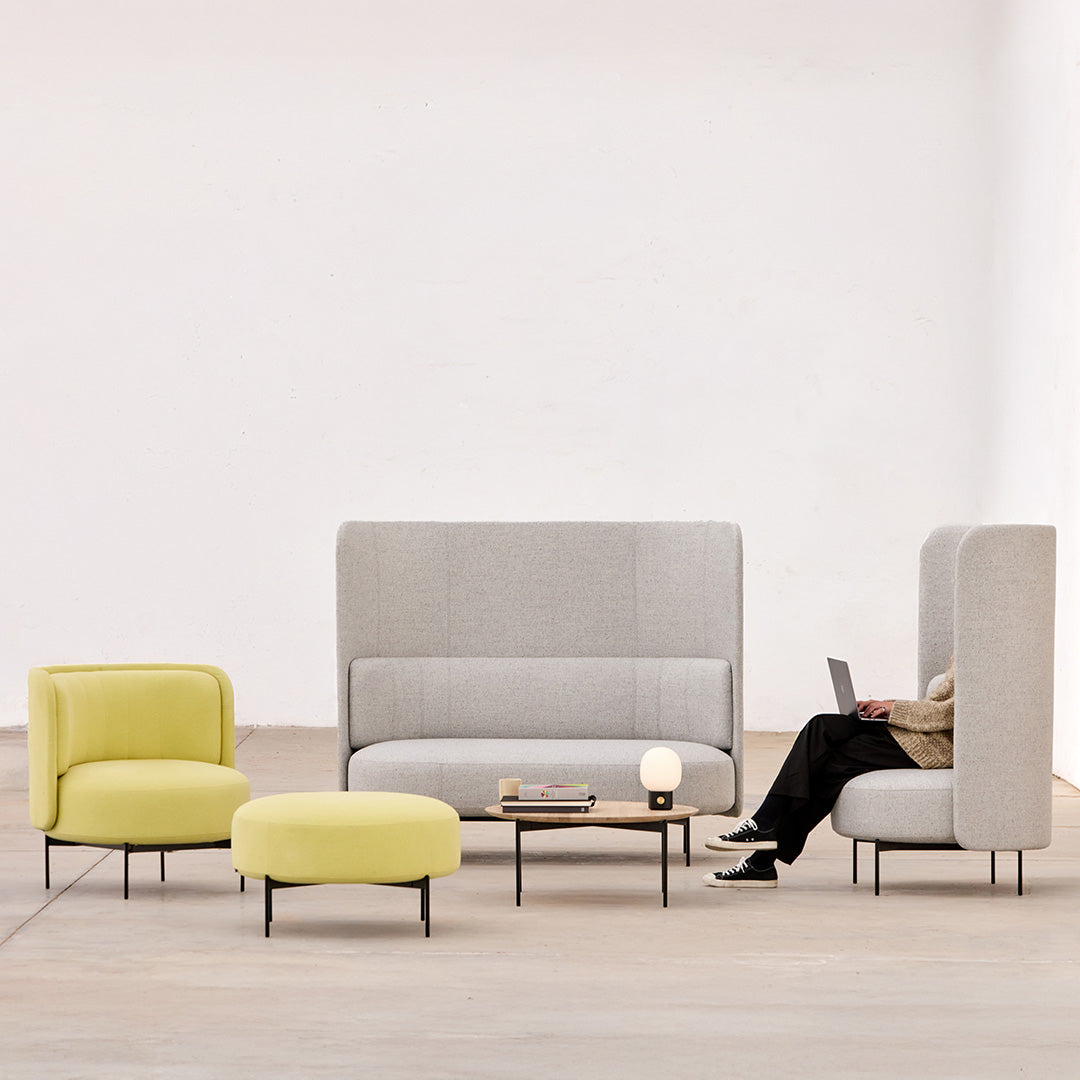 Gray and yellow modern seating set with clean lines and minimalist design, featured in a bright, neutral setting.