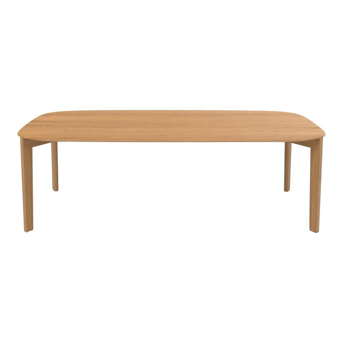 Light wooden dining table with a natural finish and smooth, rounded edges, perfect for modern dining spaces.