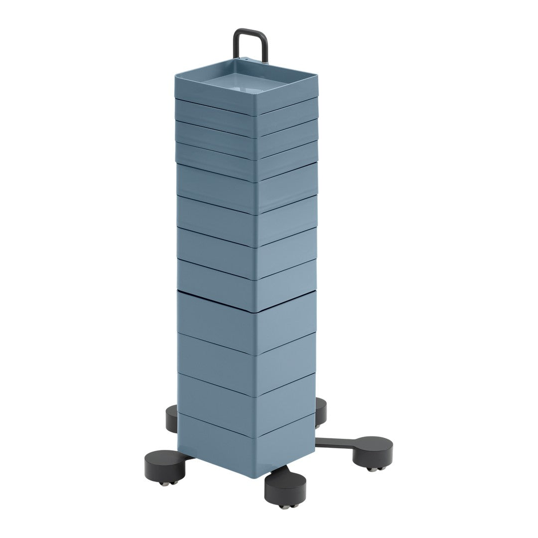 Vertical storage tower in soft blue with a sleek, minimalist design and smooth, solid color patterns.