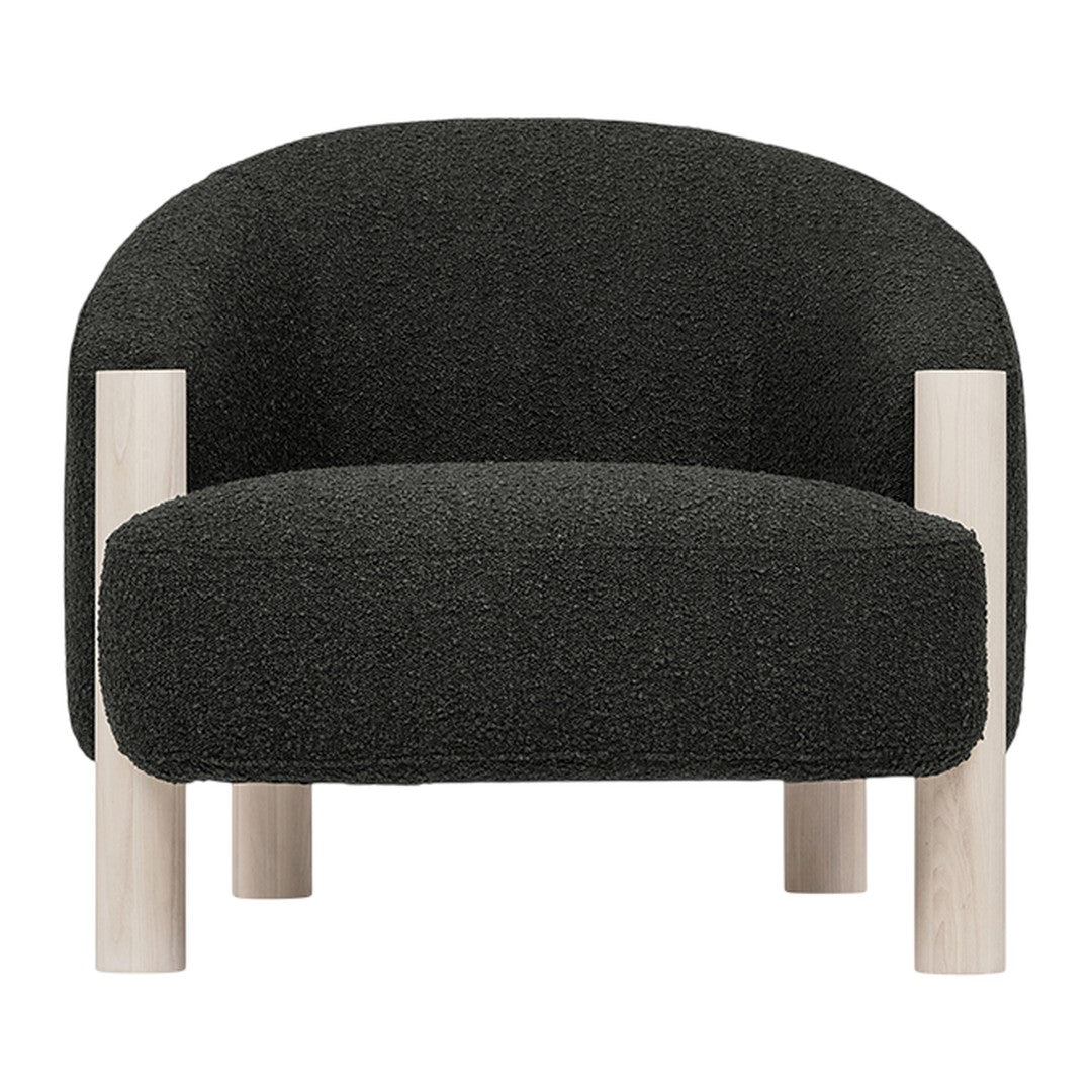 Textured black armchair with light wooden legs, featuring a modern, minimalist design. Perfect for contemporary decor.