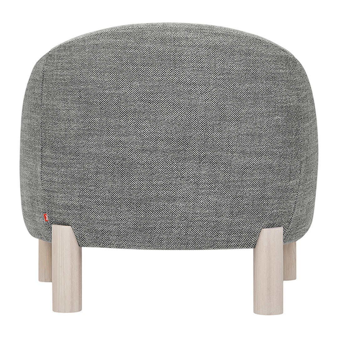 Gray fabric chair with subtle texture and light wood legs. Elegant, minimalist design for modern decor.
