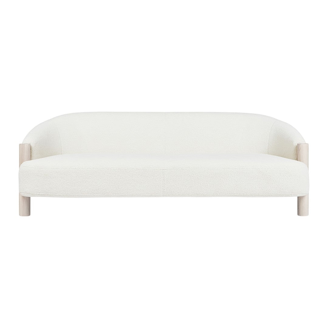 Elegant white sofa with a smooth, minimalist design and light wood accents. Perfect for modern interiors.