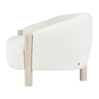 White textured armchair with minimalist wooden legs, featuring a soft, modern design. Perfect for contemporary decor.