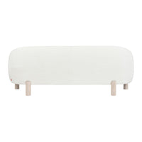 Minimalist white sofa with soft, rounded edges and light wooden legs for a contemporary look.