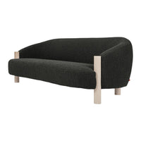 Black textured sofa with light wood legs, showcasing a sleek, modern design perfect for contemporary interiors.