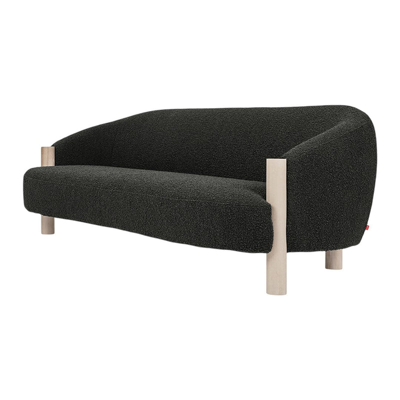 Black textured sofa with light wood legs, showcasing a sleek, modern design perfect for contemporary interiors.