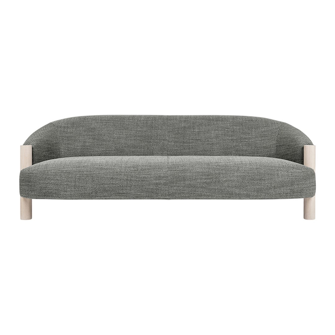 Gray upholstered sofa with a smooth texture and minimalistic design, featuring natural wood legs.