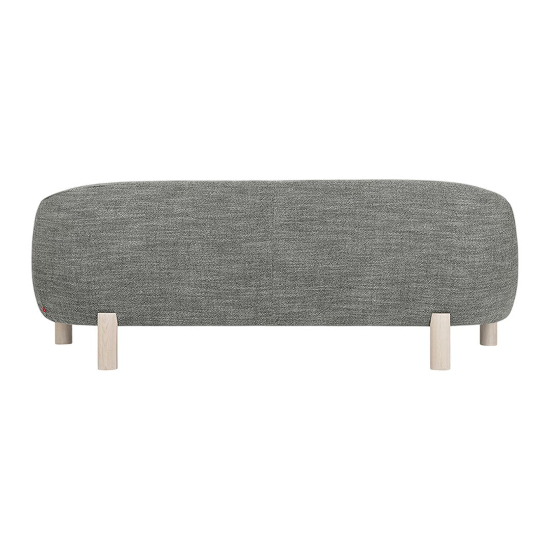 Gray upholstered bench with a smooth texture and minimalist wooden legs. Clean lines for a modern look.