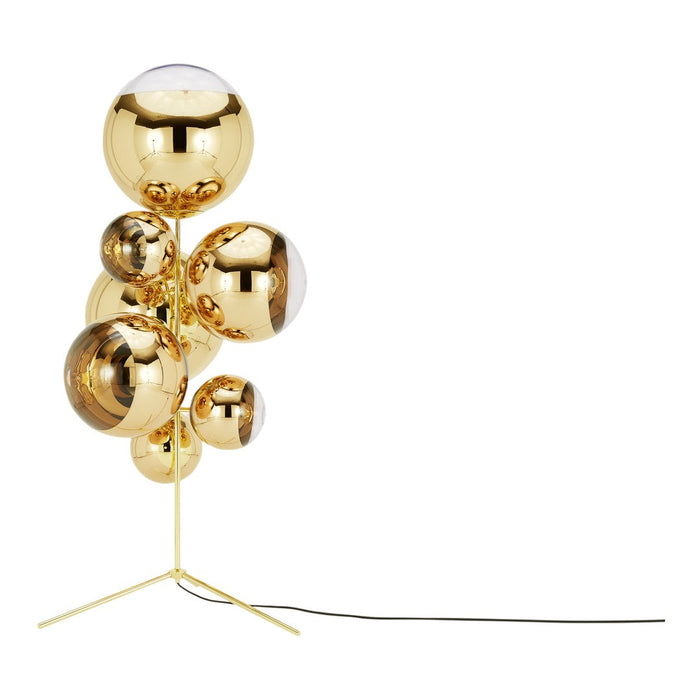 Gold and transparent spherical decorative lamp on a sleek tripod base, featuring a modern, polished finish.