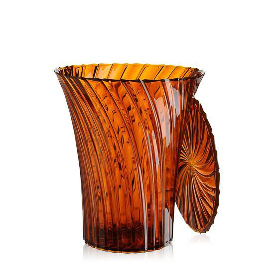 Amber glass tumbler with ridged and spiral patterns, featuring a warm, rich orange hue. Perfect for stylish decor.