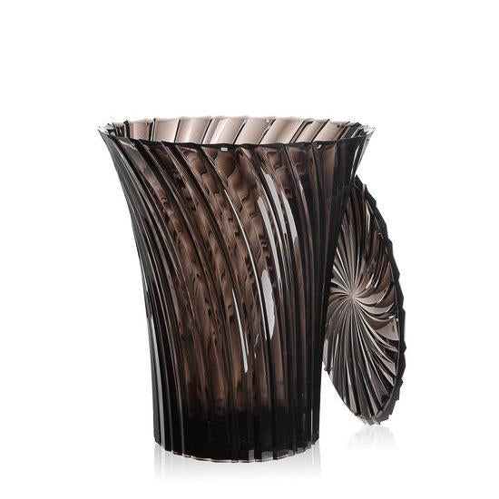 Textured black and smoky gray wastebasket with a wavy pattern and curved lid design for modern decor.