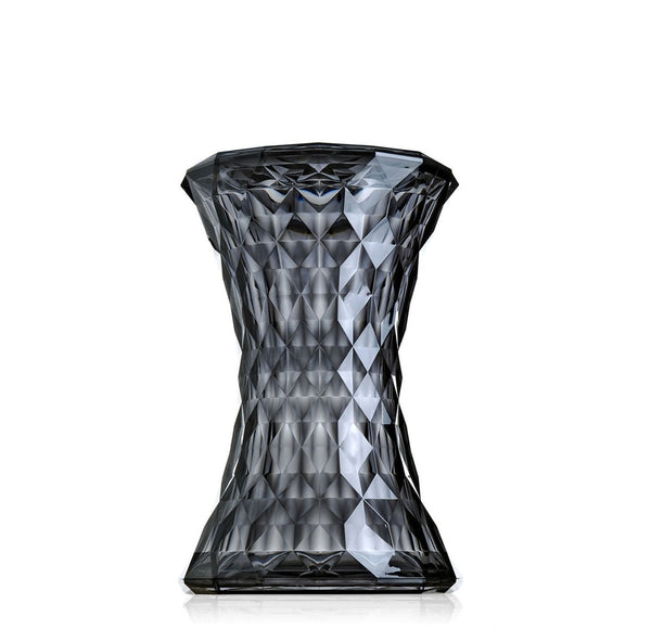 Black geometric-patterned decorative vase with a faceted design. Ideal for modern home decor.
