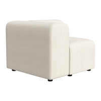 Cream-colored modular sofa with a smooth, textured fabric finish and rounded edges, perfect for modern decor.