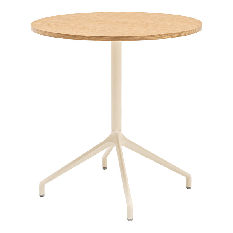 Round wooden table with a natural oak finish and a sleek cream-colored metal base. Minimalist design for modern decor.
