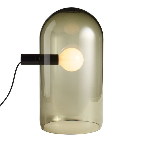 Smoky gray glass lamp with a round white bulb, featuring a sleek black base and minimalistic design.