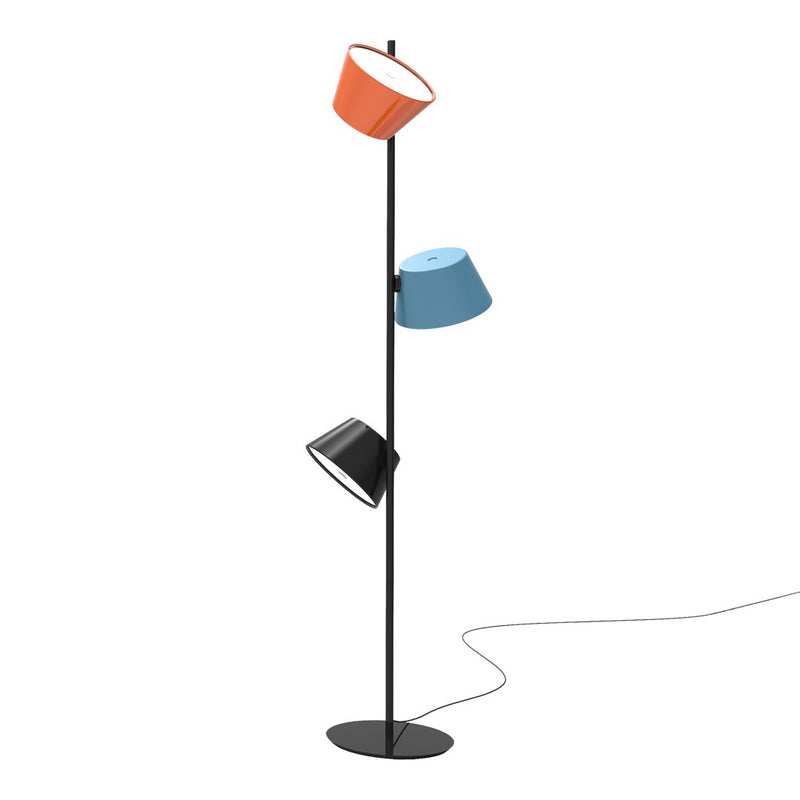 Colorful modern floor lamp with orange, blue, and black shades on a sleek black base. Stylish accent lighting.