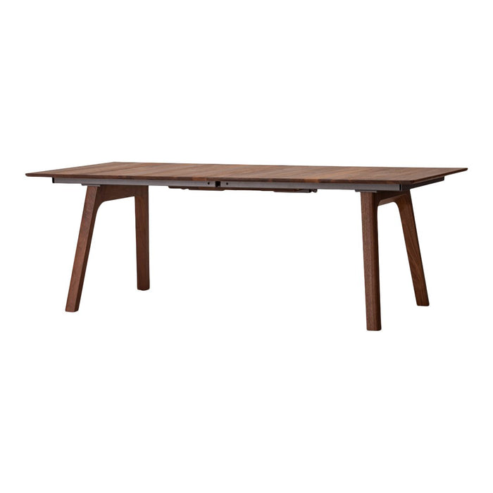 Walnut dining table featuring a sleek, minimalist design with natural wood grain and smooth, elegant edges.