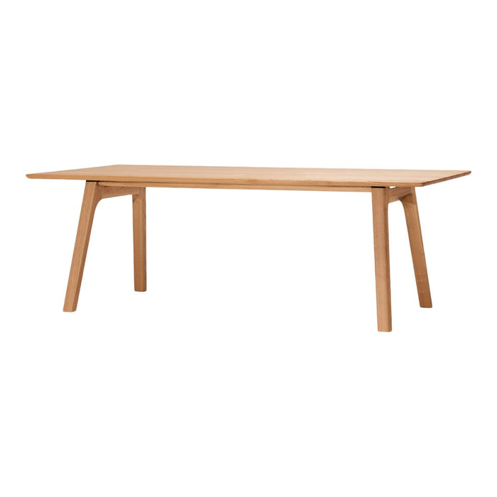 Natural wood dining table with a smooth, light oak finish and simple, clean lines. Minimalist design with no patterns.