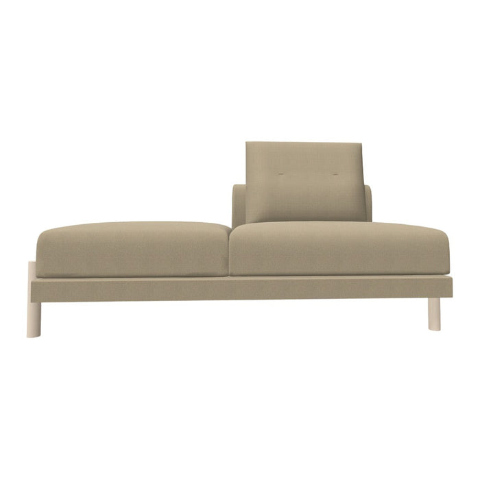 Beige sofa with clean lines and soft upholstery, featuring a simple design and a single back cushion.