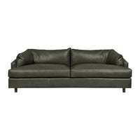 Dark green leather sofa with smooth, solid texture and plush cushions for modern elegance.