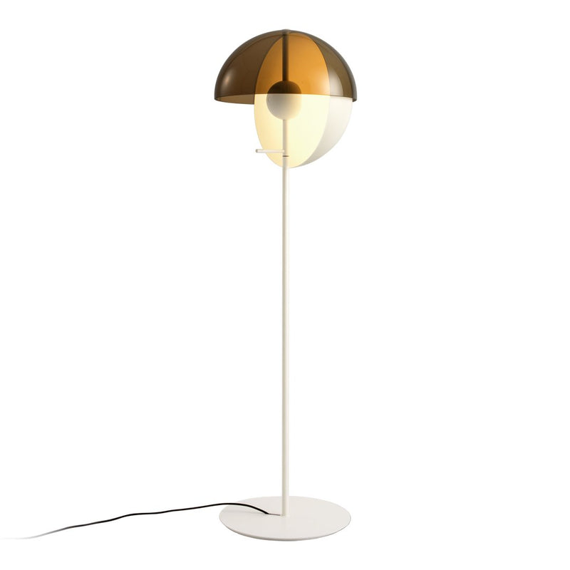 Modern floor lamp with a sleek white base and a two-toned gold and clear dome shade. Elegant minimalist design.