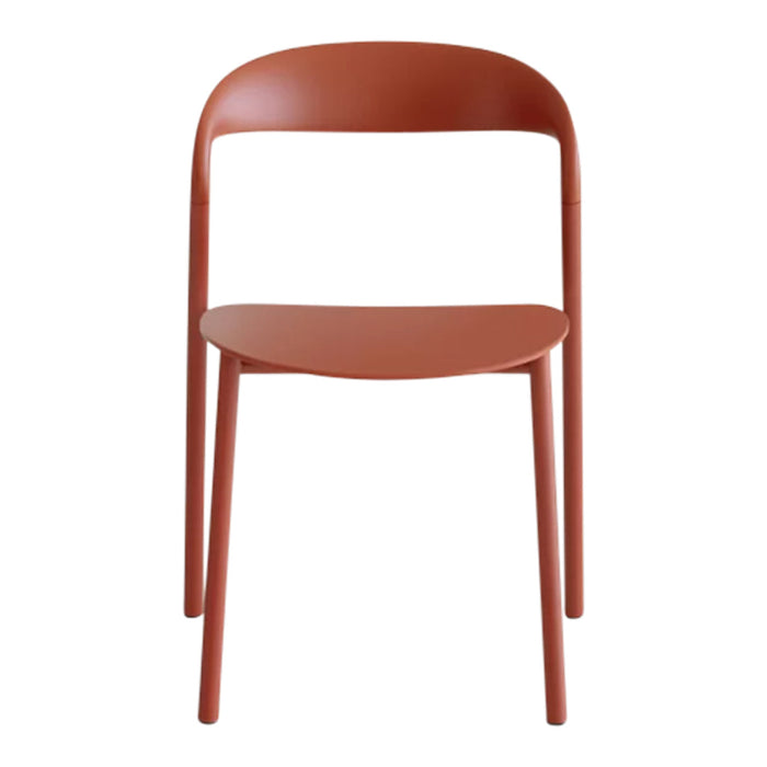 Rust-colored modern chair with a minimalist design and smooth matte finish. Perfect for contemporary decor.