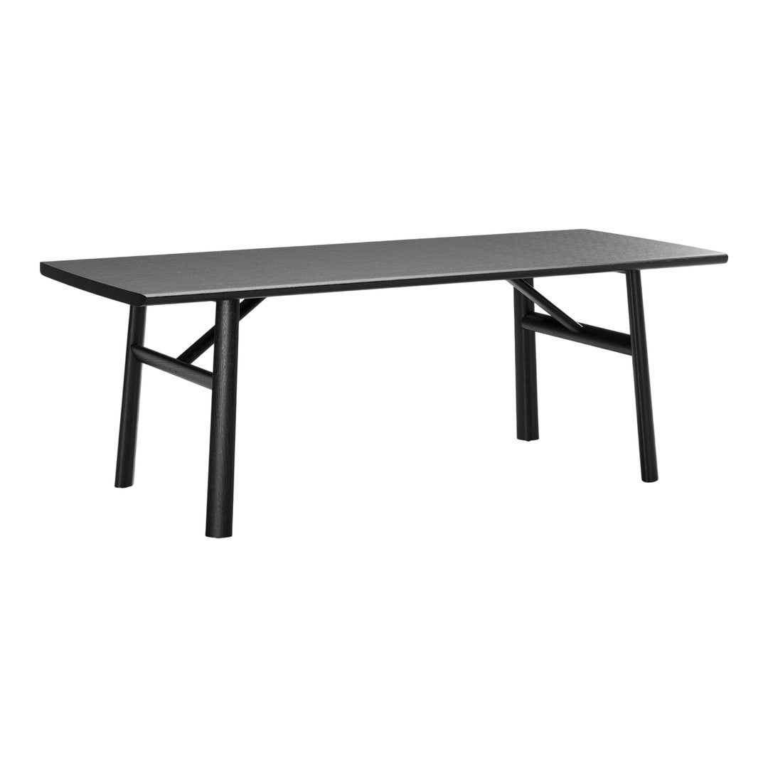 Stylish black rectangular dining table with a sleek minimalist design and sturdy angular legs. Perfect for modern interiors.