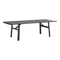 Sleek black rectangular dining table with minimalistic design and modern black metal legs. Perfect for contemporary spaces.