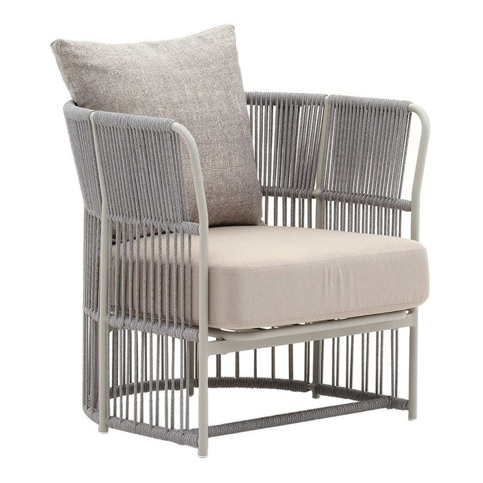 Gray woven chair with a light beige cushion and a textured gray pillow, perfect for modern decor.