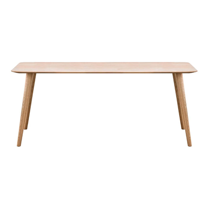 Minimalist light wood dining table with sleek, natural finish and angled legs. Perfect for modern decor.