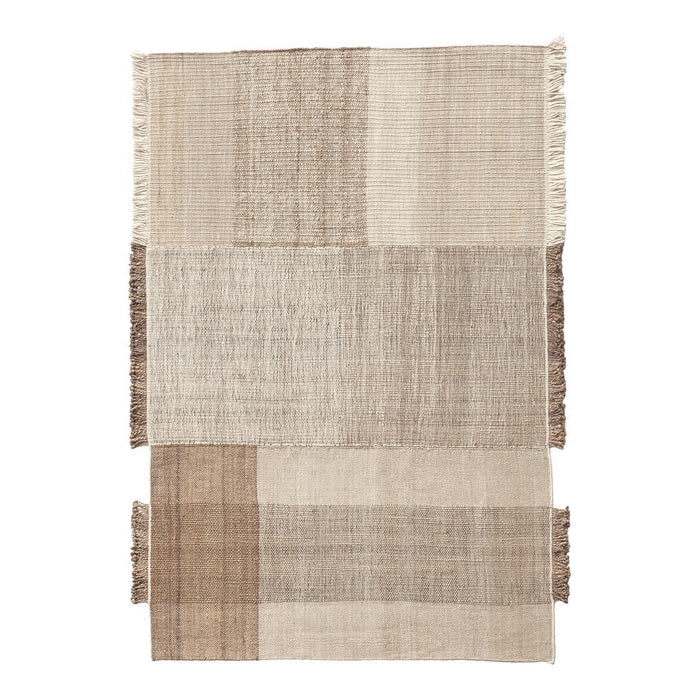 Beige and brown patterned woven rug with a mix of textures and fringed edges, adding earthy elegance to any space.
