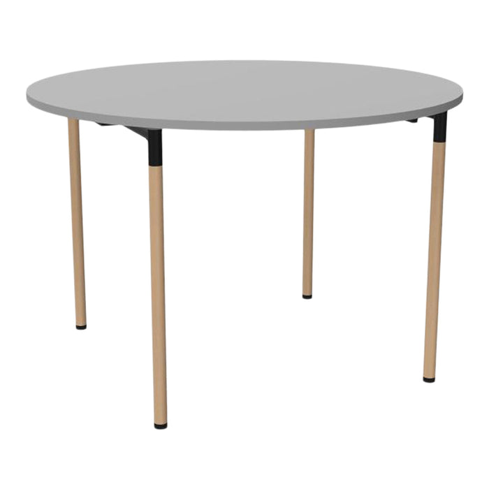 Round gray table with natural wood legs and black accents, featuring a sleek, modern design.