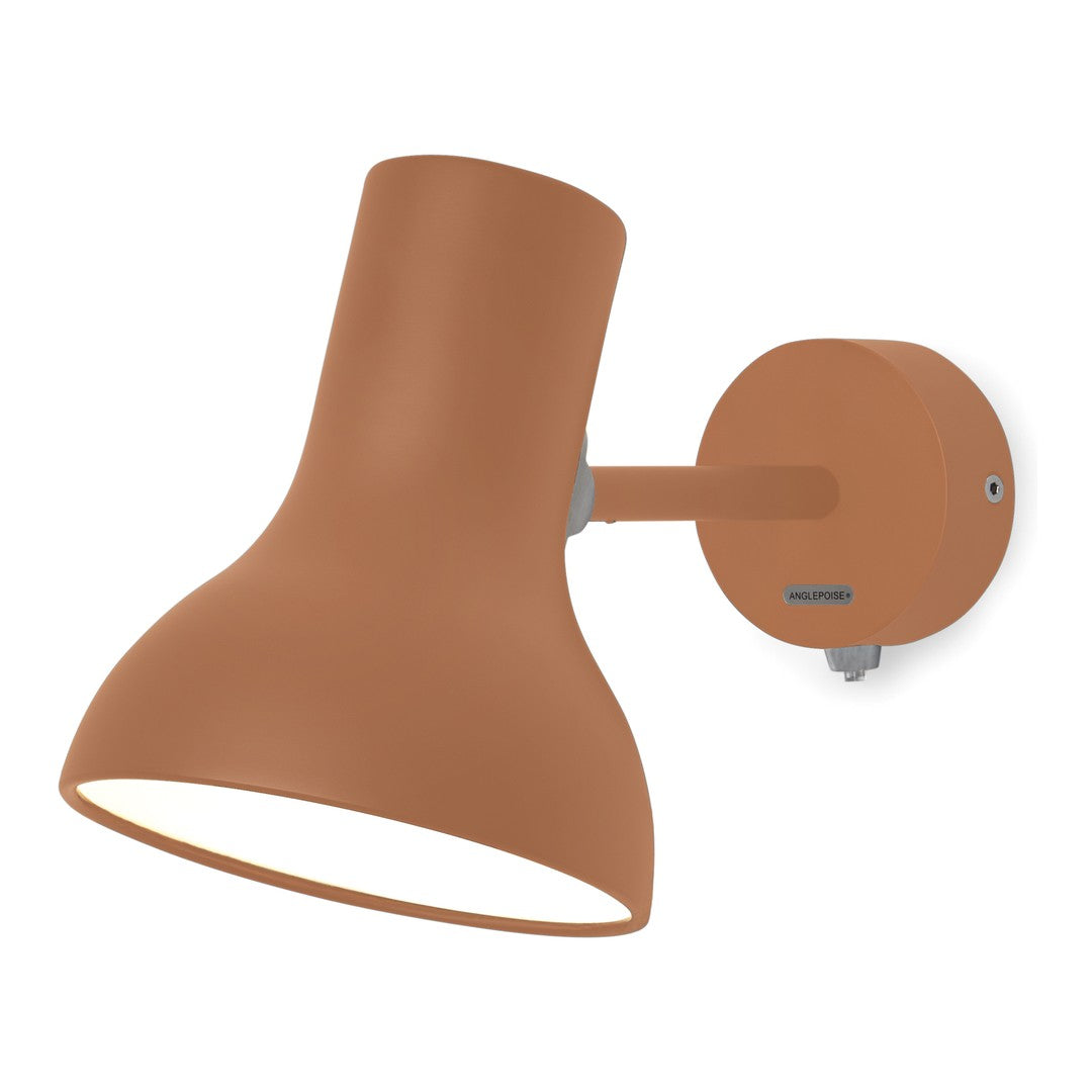 Terracotta wall lamp with a sleek, modern design and smooth matte finish. Perfect for adding a warm touch to any space.