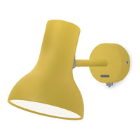 Yellow wall-mounted lamp with a smooth, modern design. Perfect for adding a cheerful touch to any space.