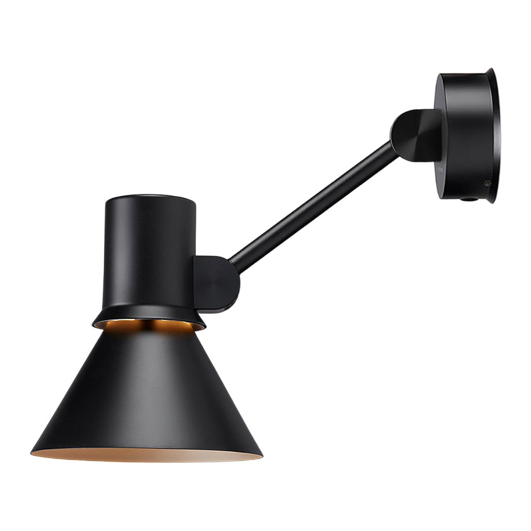 Black wall lamp with a conical shade and golden interior, featuring a sleek, minimalist design. Ideal for modern decor.