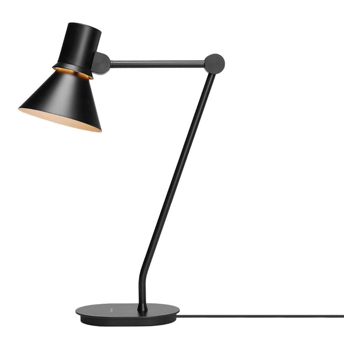 Sleek black desk lamp with a minimalist design and metallic gold accents. Perfect for modern decor.