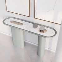 Modern oval console table with a soft green finish and marble-patterned top, featuring smooth, rounded edges.