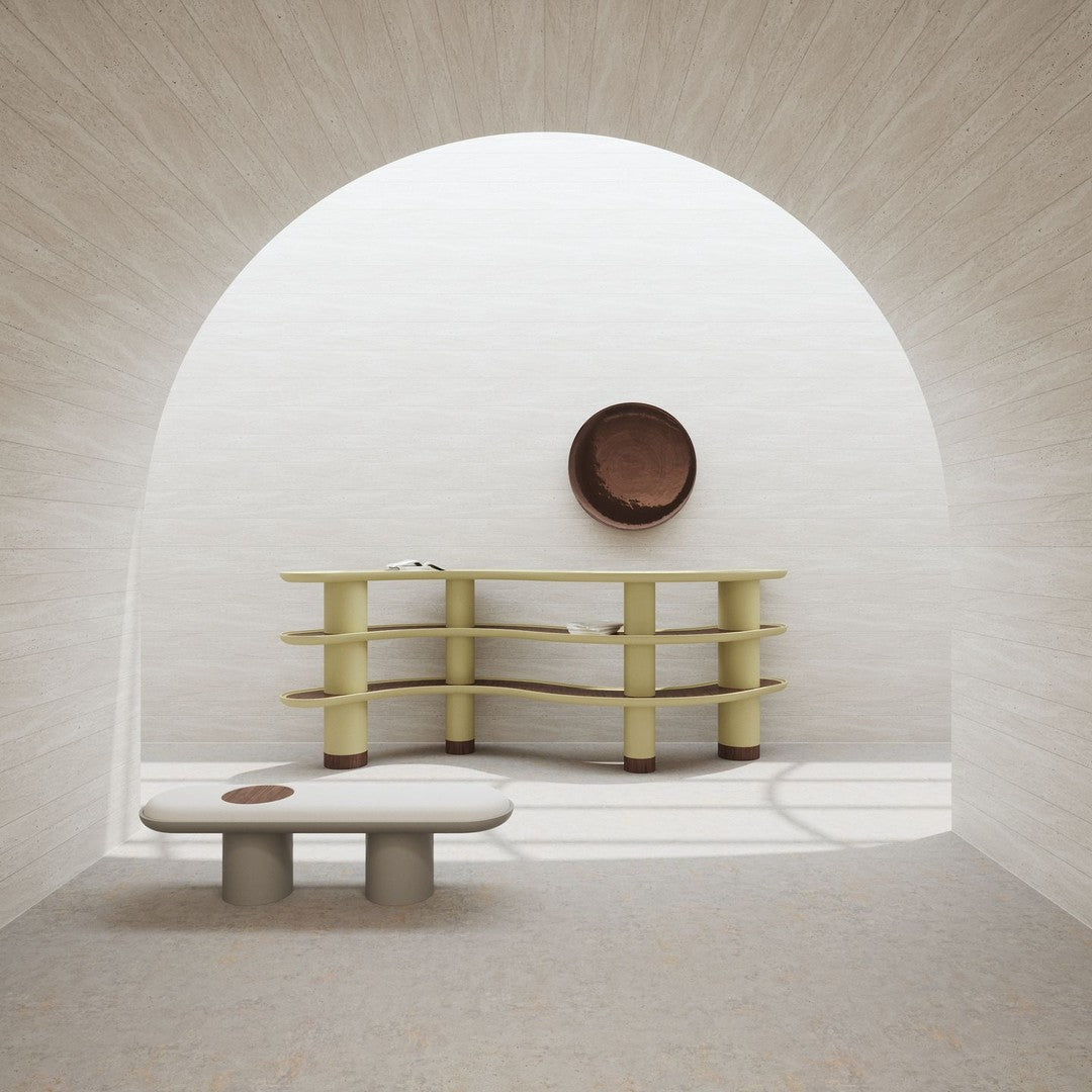 Modern furniture in soft gray and muted yellow with smooth textures, complemented by a brown circular accent.