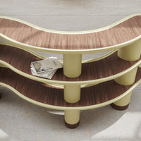 Curved shelf featuring pastel yellow and rich brown wood grain patterns, creating a modern, playful design.