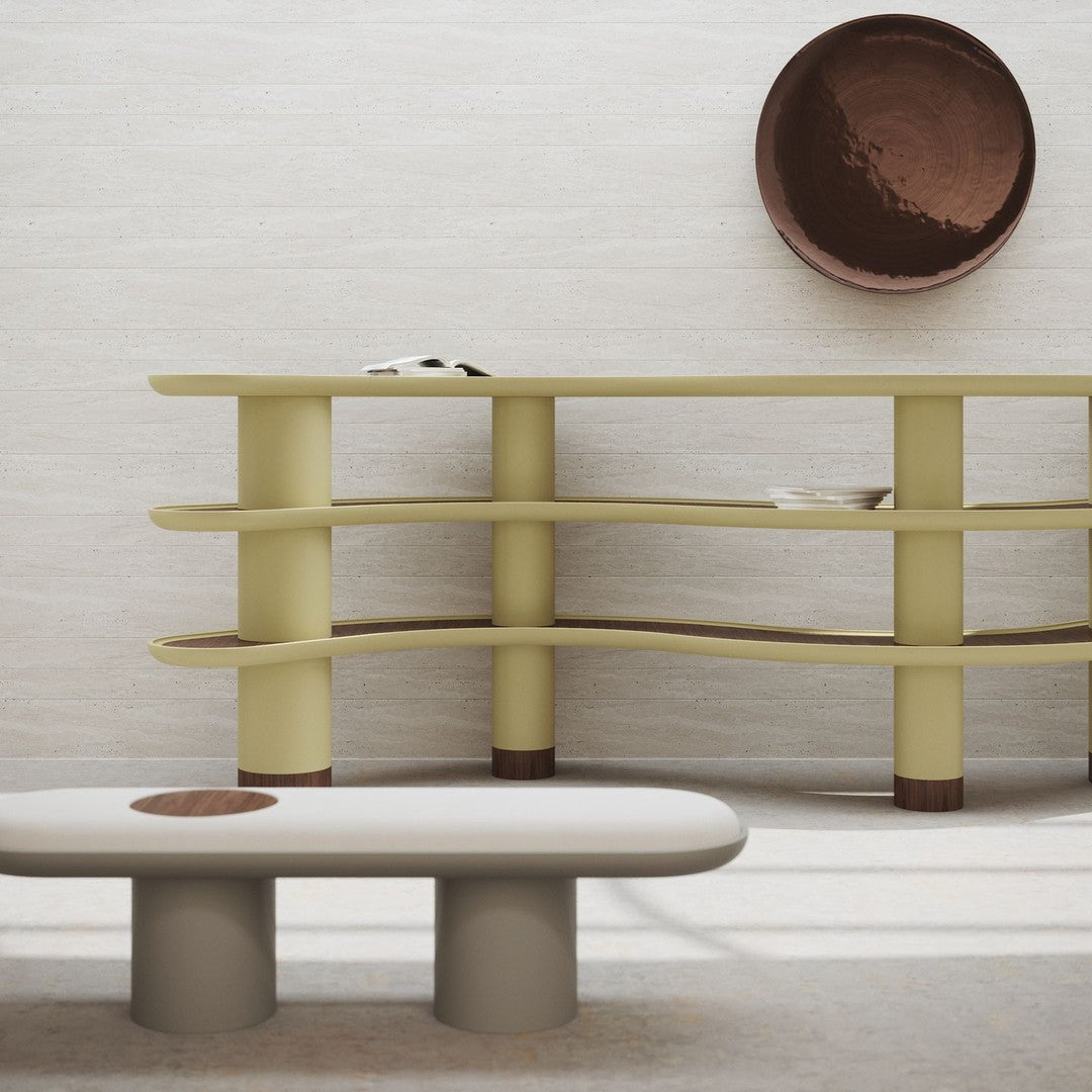 Modern furniture featuring soft yellow and neutral tones with smooth, rounded shapes and minimalistic design elements.