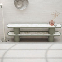 Modern green and white marble console table with sleek, rounded edges and elegant design against a neutral backdrop.