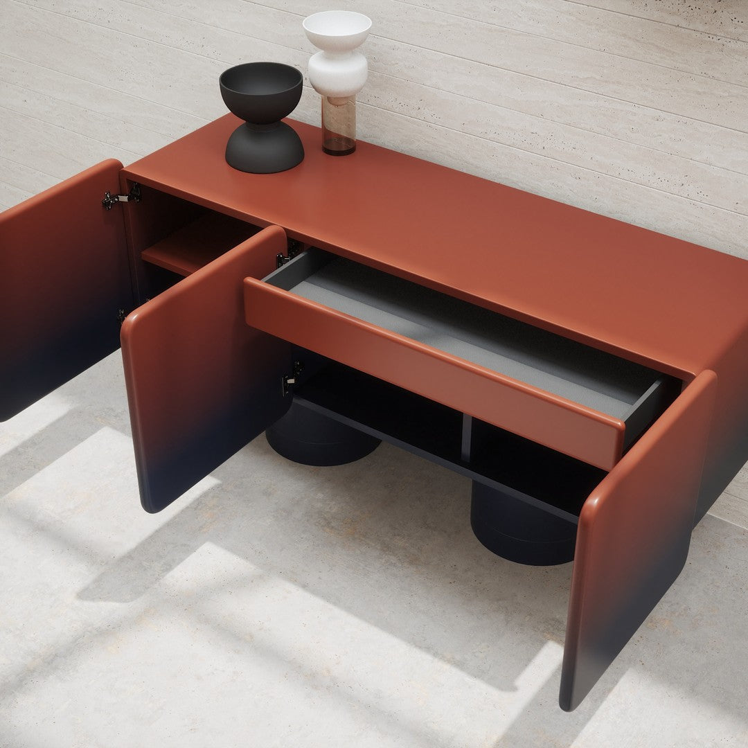 "Modern rust-red storage table with sleek black accents and minimalist design, featuring smooth, geometric lines."